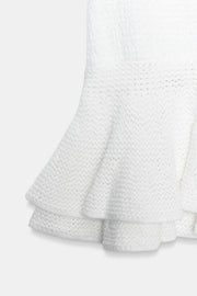 Jupe mini en maille à volants