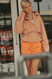 Veste à clous avec ceinture