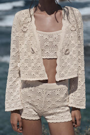 Veste en maille pointelle à fleurs