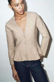 Veste en maille peplum